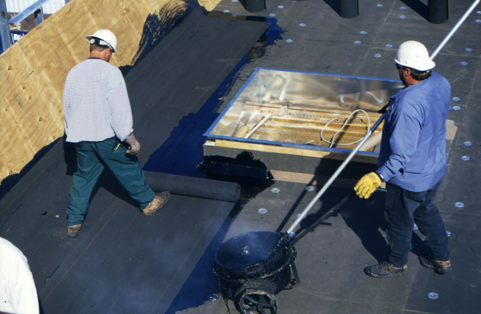 the base sheet being installed for a commercial roofing job